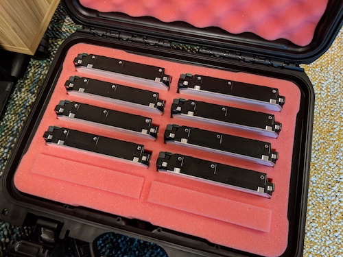 a picture of eight hard drives in a protective case